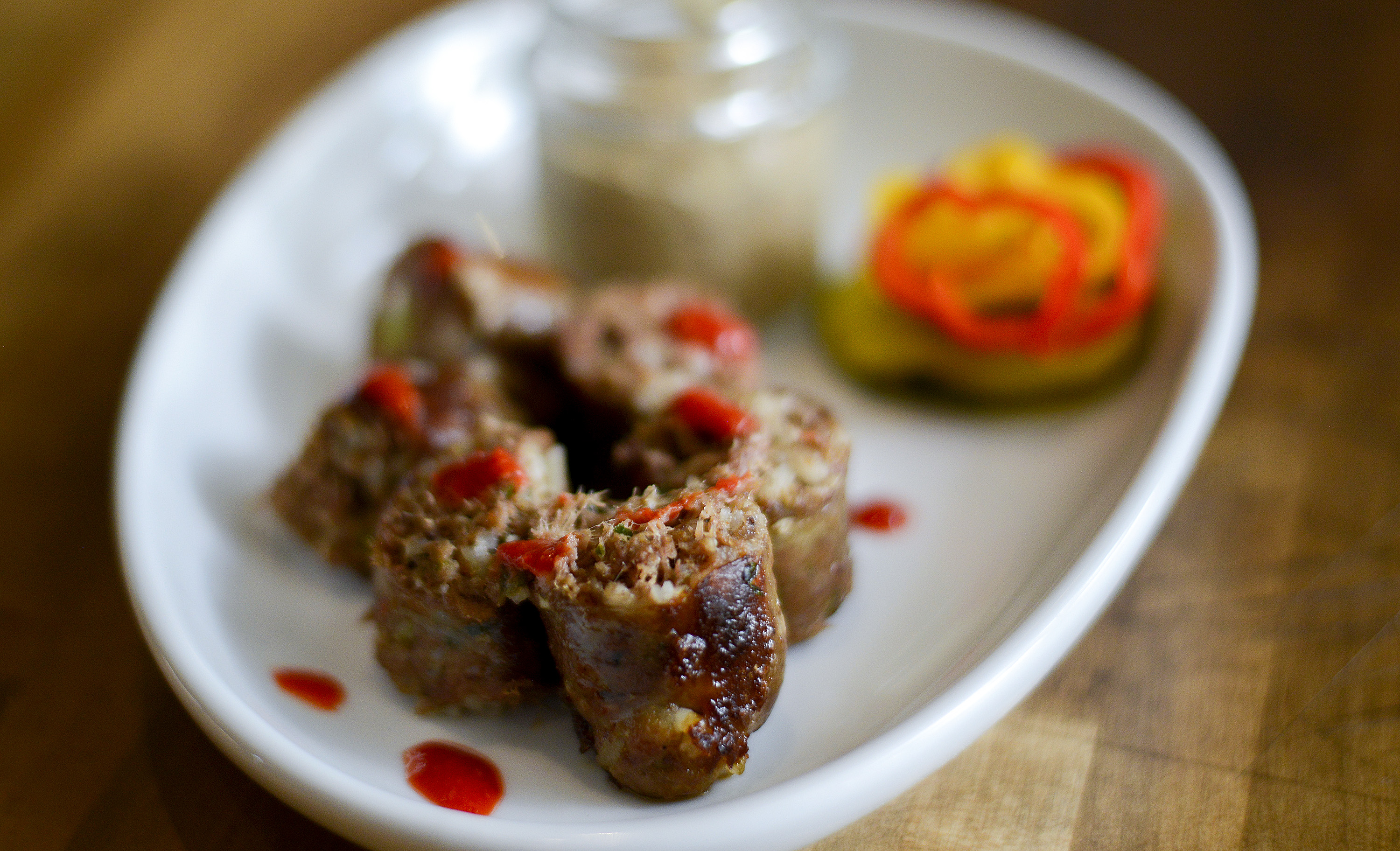 Boudin sausage with Creole mustard and pickled vegetables at The Butcher and The Bar in Boynton Beach, a whole-animal butcher and restaurant-bar that permanently closed in November after five years in business. (Michael Laughlin/South Florida Sun Sentinel file)