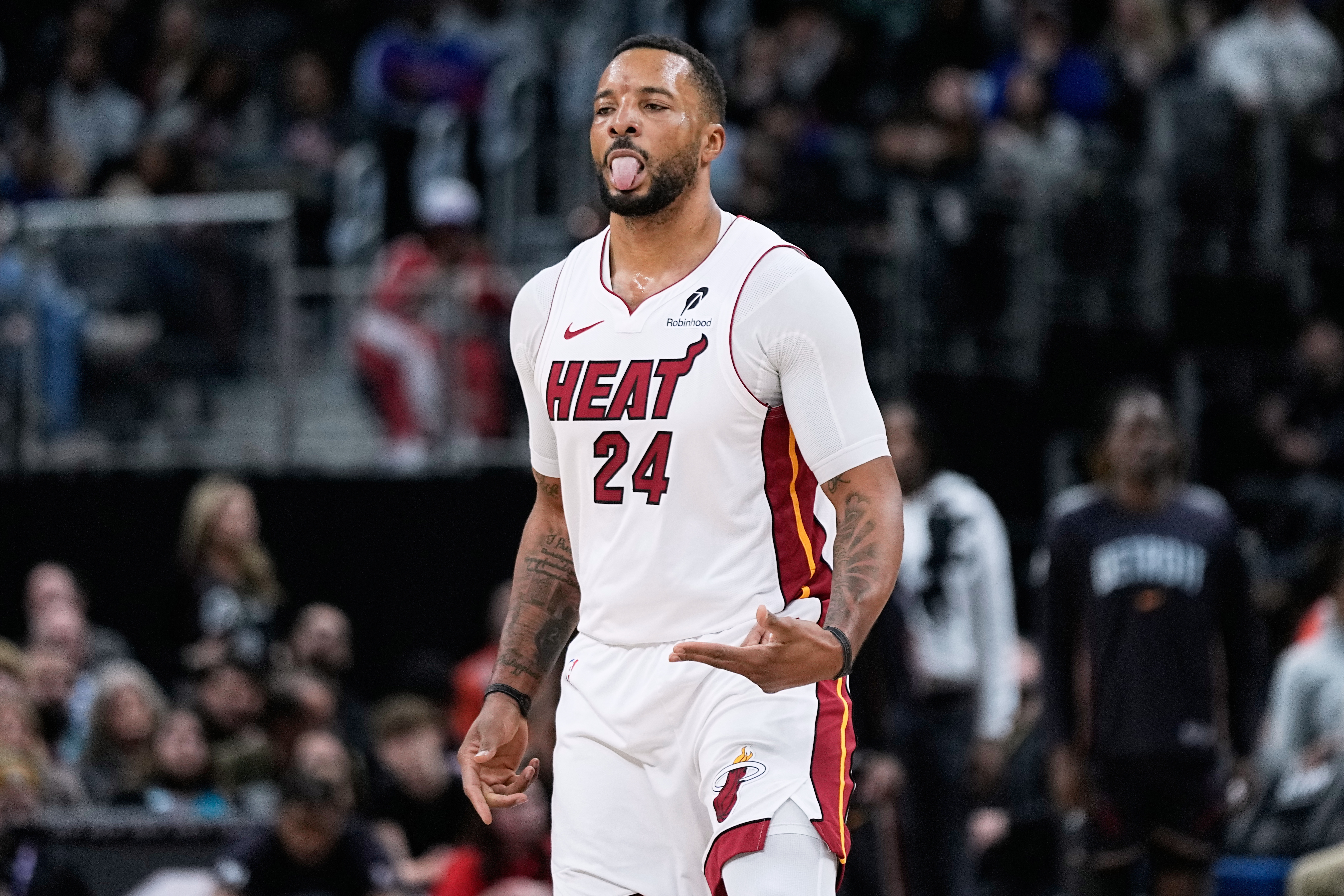 Miami Heat guard Norman Powell celebrates after making a three-point basket during the first half of an NBA basketball game against the Detroit Pistons Thursday, Jan. 1, 2026, in Detroit. (AP Photo/Ryan Sun)