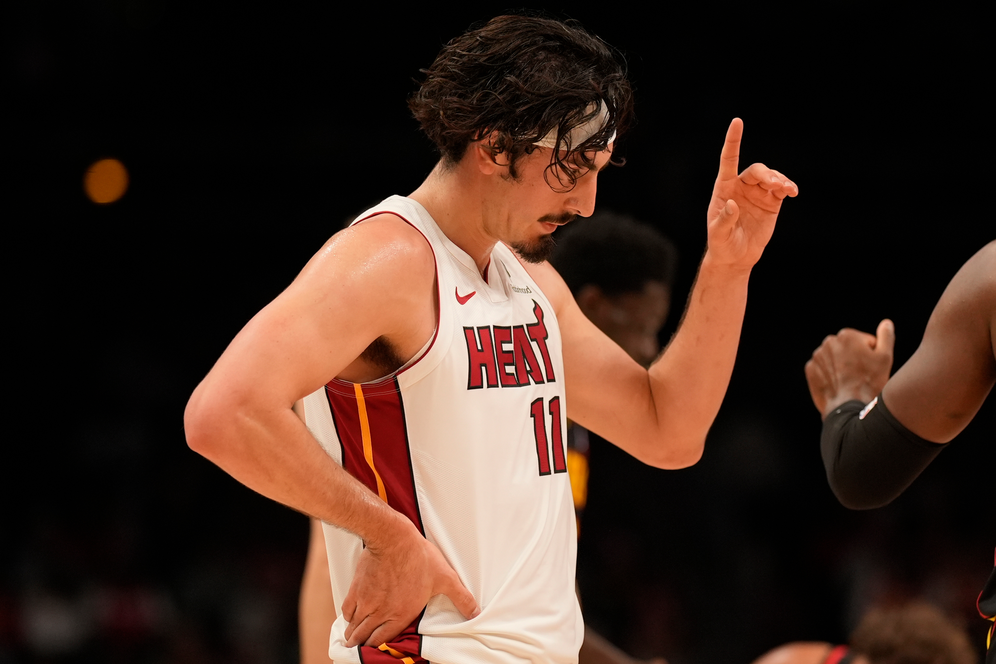 Miami Heat forward Jaime Jaquez Jr. (11) reacts to a foul against the Atlanta Hawks during the first half of an NBA basketball game, Friday, Dec. 26, 2025, in Atlanta. (AP Photo/Mike Stewart)