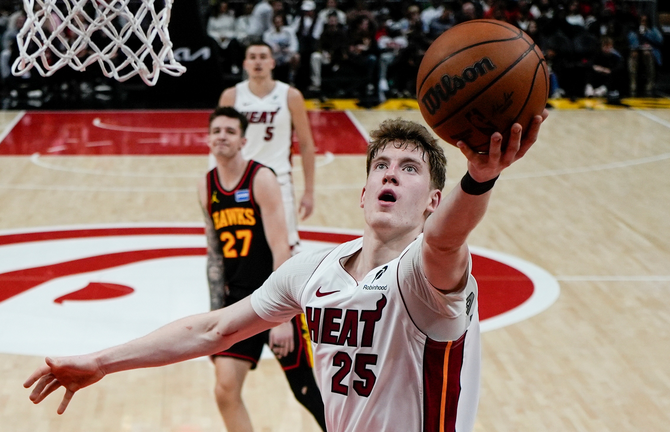Miami Heat guard Kasparas Jakucionis (25) shoots against the Atlanta Hawks during the second half of an NBA basketball game, Friday, Dec. 26, 2025, in Atlanta. (AP Photo/Mike Stewart)