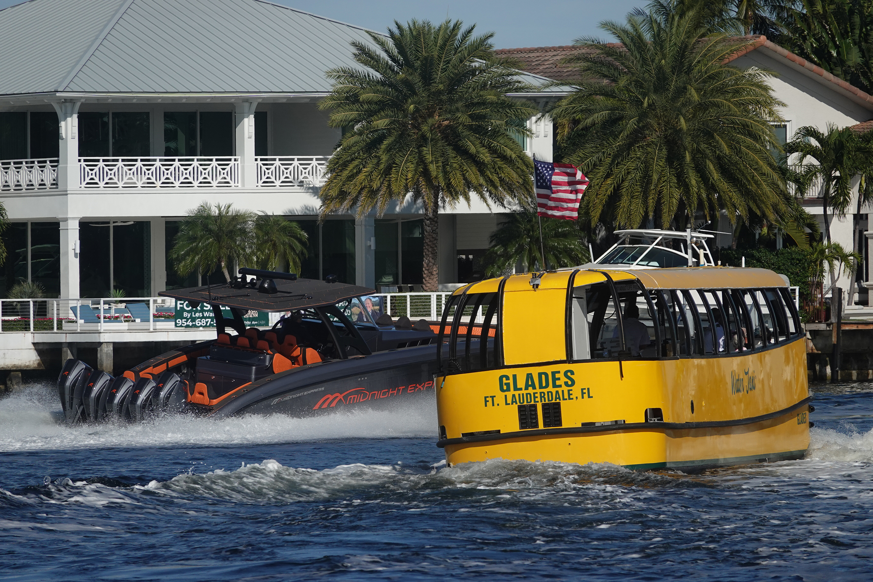 A boat advances on the Intracoastal Waterway at Hugh Taylor Birch State Park, with a water taxi nearby, on Tuesday, Dec. 30, 2025. A new slow-speed, minimum-wake zone is being established to improve safety between the Oakland Park Boulevard and Sunrise Boulevard bridges. (Joe Cavaretta/South Florida Sun Sentinel)