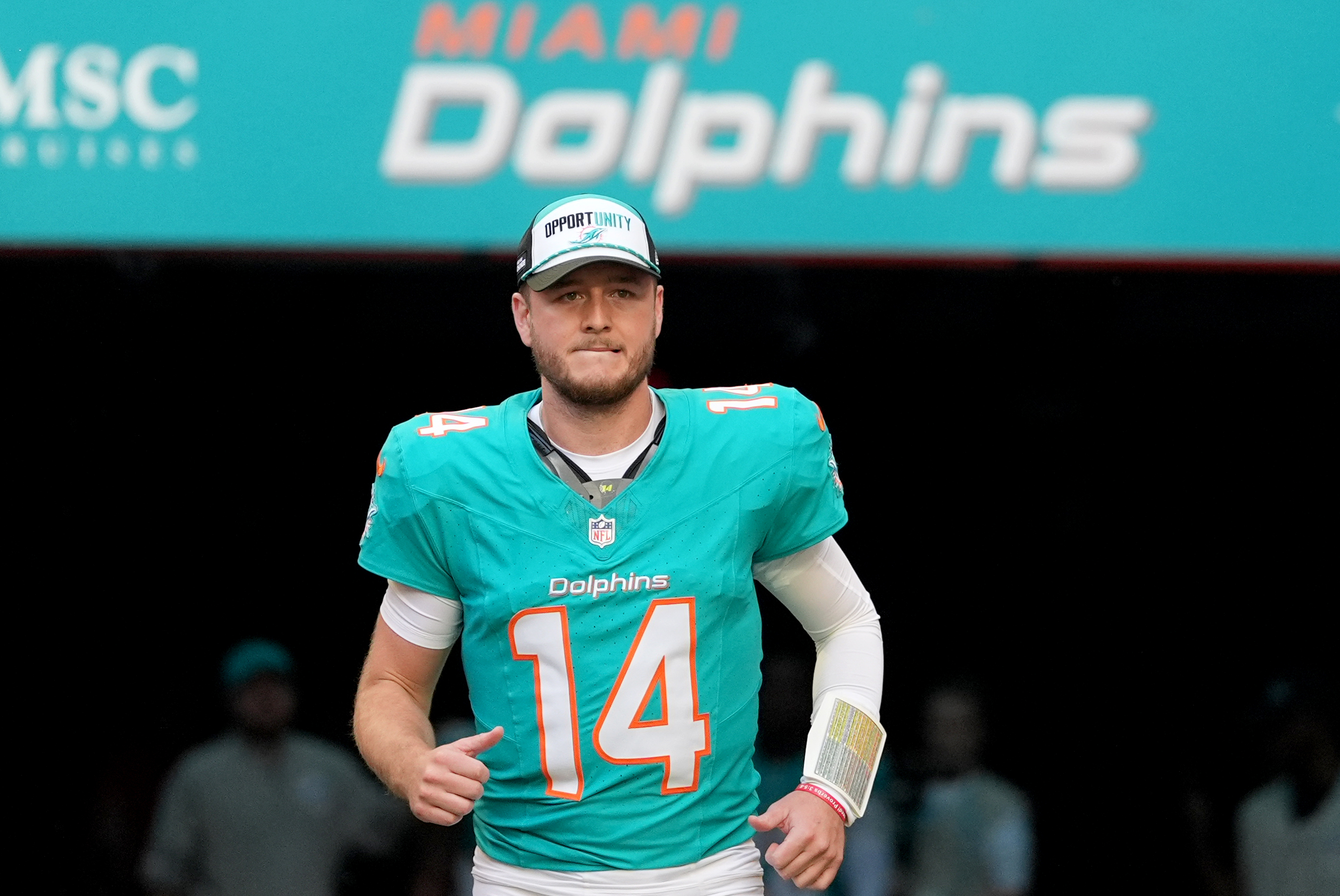 Dolphins QB Quinn Ewers (14) runs on field before a game against the Buccaneers on Dec. 28, 2025 in Miami Gardens. (AP Photo/Rebecca Blackwell)